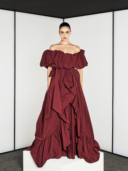 BURGUNDY MATTE SATIN TUBE DRESS WITH DRAMATIC CAPE AND BELT
