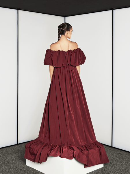 BURGUNDY MATTE SATIN TUBE DRESS WITH DRAMATIC CAPE AND BELT