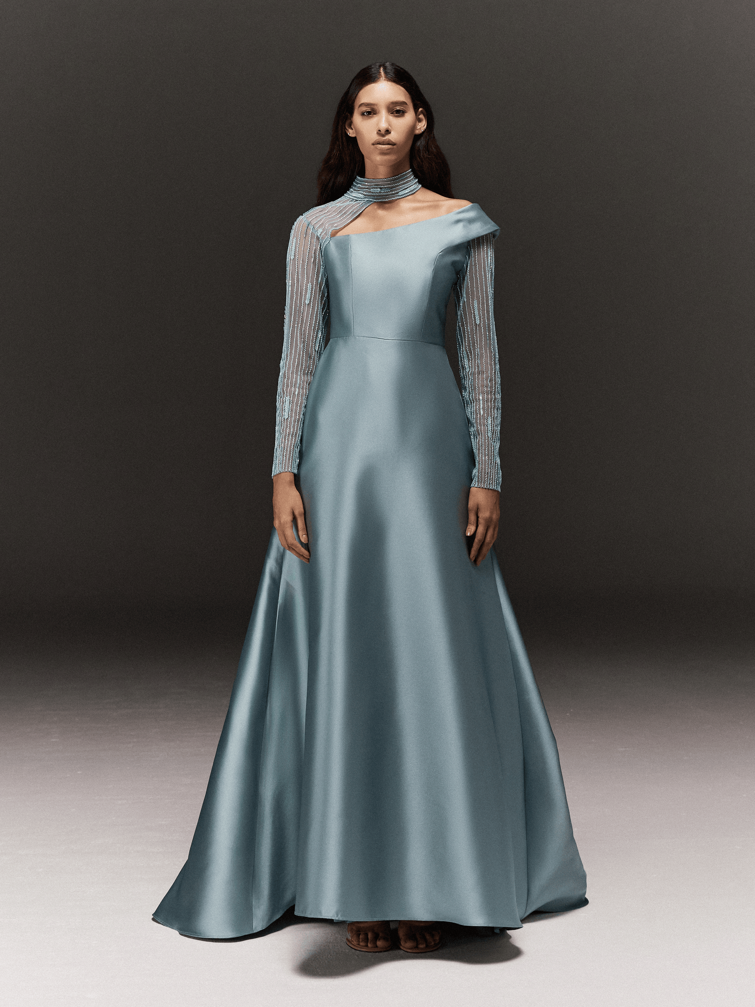 TURQUOISE SATIN ASYMMETRICAL FLARED DRESS WITH SHEER HAND EMBROIDERED SLEEVES AND NECK