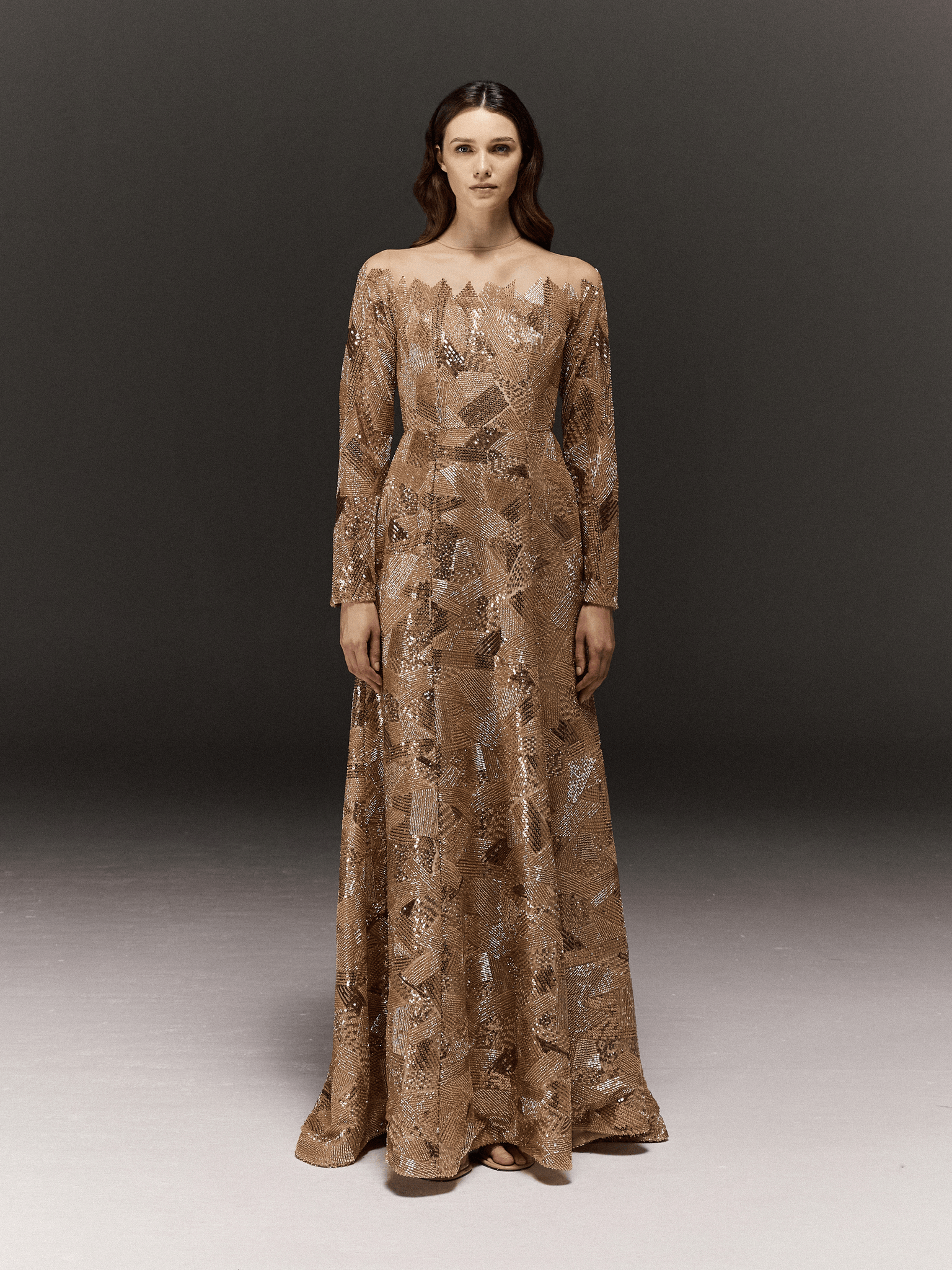 GOLDEN FULLY HAND EMBROIDERED AND PANELLED FULL SLEEVE DRESS WITH SLIGHT TRAIL