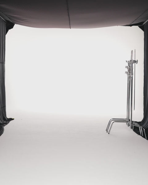 BLACK MULTIPANEL SATIN FLARED DRESS WITH ORGANZA TRAIL