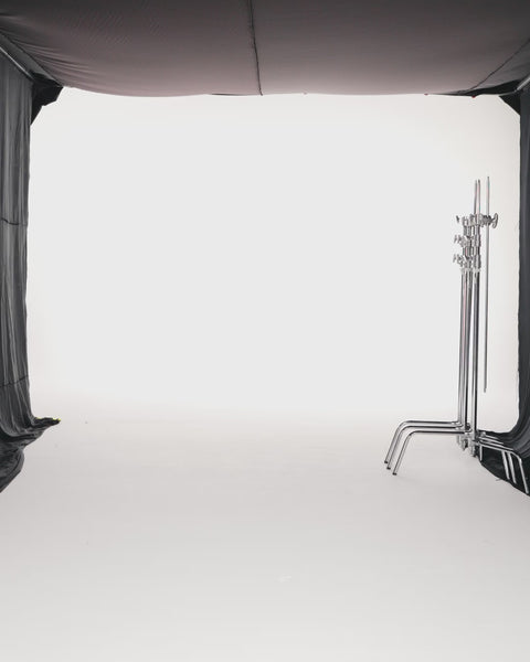 BLACK AND WHITE MULTI-PANEL TUBE DRESS WITH TRAIL